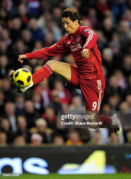 Fernando Torres of Liverpool wins the ball during the Barclays Premier League match between Liverpool and Chelsea at Anfield on November 7, 2010 in...
