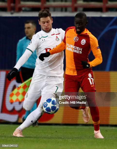 Grzegorz Krychowiak of FC Lokomotiv Moscow and Badou Ndiaye of Galatasaray vie for the ball during the Group D match of the UEFA Champions League...