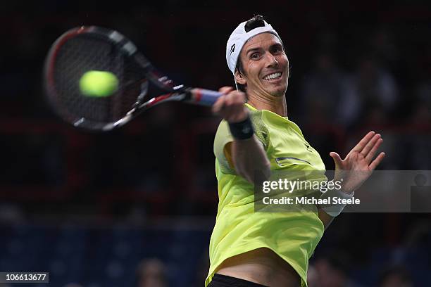 Juan Ignacio Chela of Argentina in action during his match against Ernests Gulbis of Latvia during Day One of the ATP Masters Series Paris at the...