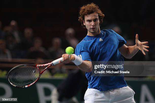 Ernests Gulbis of Latvia in action during his match against Juan Ignacio Chela of during Day One of the ATP Masters Series Paris at the Palais...