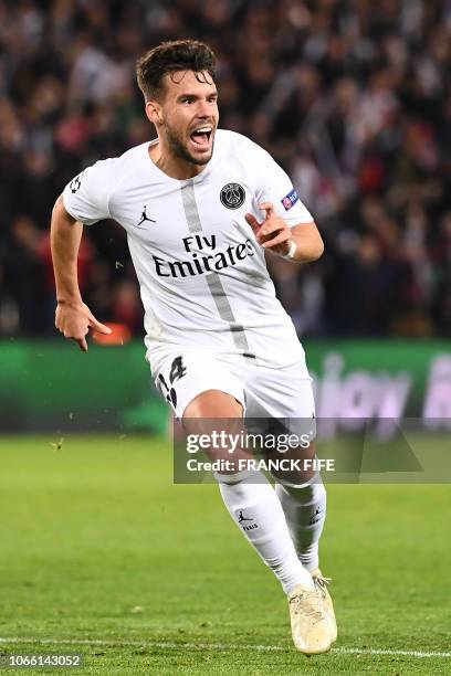 Paris Saint-Germain's Spanish defender Juan Bernat celebrates after scoring a goal during the UEFA Champions League Group C football match between...