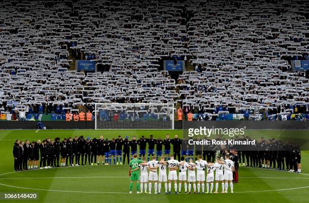 Leicester City and Burnley FC stand for a two minute silence memory of Chairman Vichai Srivaddhanaprabha and remembrance Sunday before the Premier...