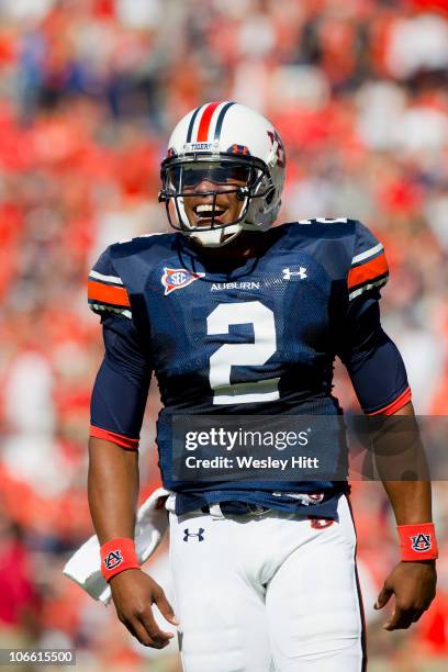 Quarterback Cam Newton of the Auburn Tigers is all smiles during a game against the Arkansas Razorbacks at Jordan-Hare Stadium on October 16, 2010 in...