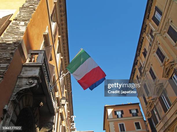 streets of the historical center of the city of rome - ancient roman flag stock pictures, royalty-free photos & images