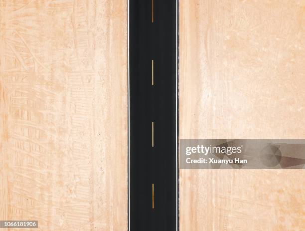 high angle view of road in desert - desert horizon stock pictures, royalty-free photos & images