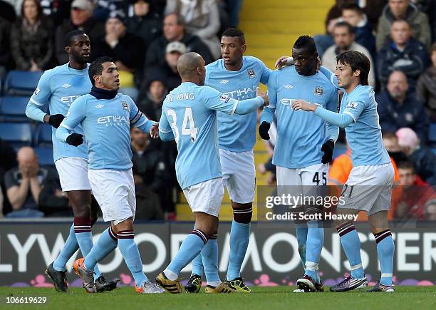 Manchester City's Mario Balotelli celebrates after scoring their second goal during the Barclays Premier League match between West Bromwich Albion...