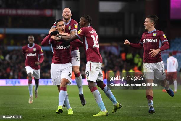 Anwar El Ghazi of Aston Villa is mobbed by team mates after scoring to make it 5-4 during the Sky Bet Championship match between Aston Villa and...