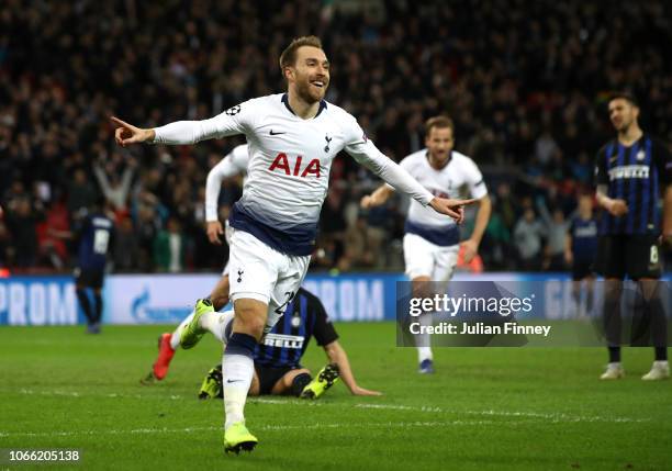 Christian Eriksen of Tottenham Hotspur celebrates after he scores his sides first goal during the UEFA Champions League Group B match between...