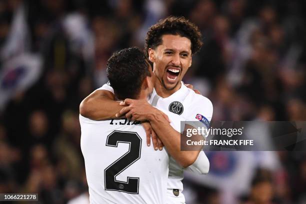 Paris Saint-Germain's Brazilian defender Thiago Silva celebrate with Paris Saint-Germain's Brazilian defender Marquinhos after winning at the end of...