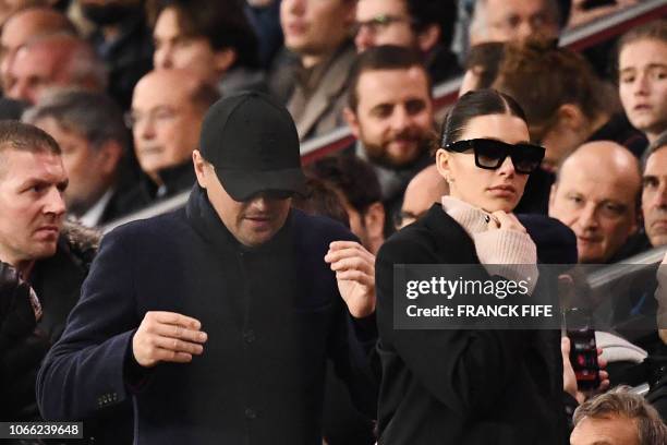 Actor Leonardo Di Caprio and his partner Argentinian and US model Camilla Morrone attend the UEFA Champions League Group C football match between...