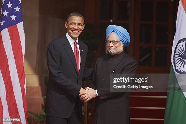 President Barack Obama shakes hands with Indian Prime Minister Manmohan Singh ahead of their meeting at Hyderabad House on November 8, 2010 in New...