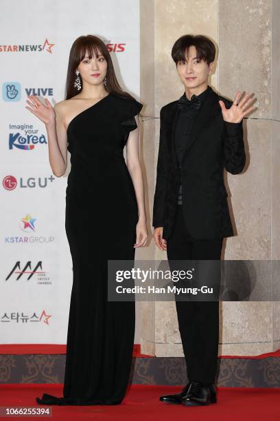 South Korean actress Lee Sung-Kyung and Leeteuk of South Korean boy band Super Junior attend the 2018 Asia Artist Awards on November 28, 2018 in...