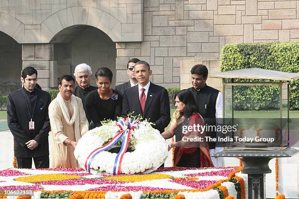 President Barack Obama and his wife Michelle Obama visit Mahatma Gandhi's memorial Rajghat and pay tribute to the father of the nation on Monday,...