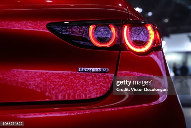 Detailed view of the Mazda3 is seen onstage during the L.A. Auto Show on November 28, 2018 in Los Angeles, California.