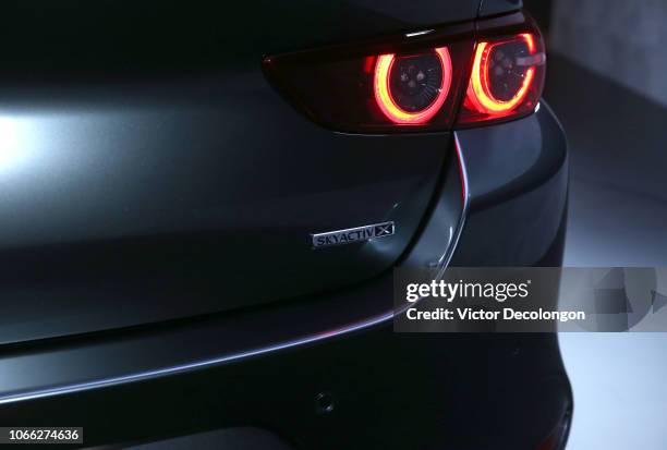 General view of the all-new Mazda3 is seen during the L.A. Auto Show on November 28, 2018 in Los Angeles, California.