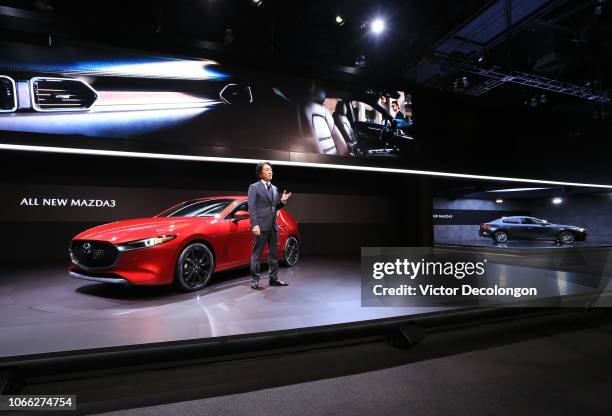 Masahiro Moro, President and CEO, Mazda North American Operations, speaks onstage during the L.A. Auto Show on November 28, 2018 in Los Angeles,...