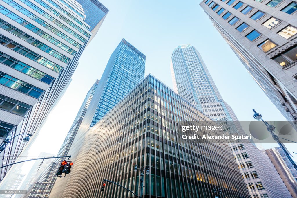 Low angle view of modern office buildings skyscrapers in Manhattan Midtown, New York