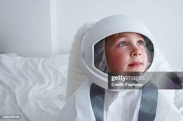 portrait of boy dressed as an astronaut  - thinking fantasy stock pictures, royalty-free photos & images