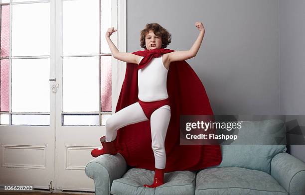 portrait of a boy dressed as a superhero - cape garment fotografías e imágenes de stock