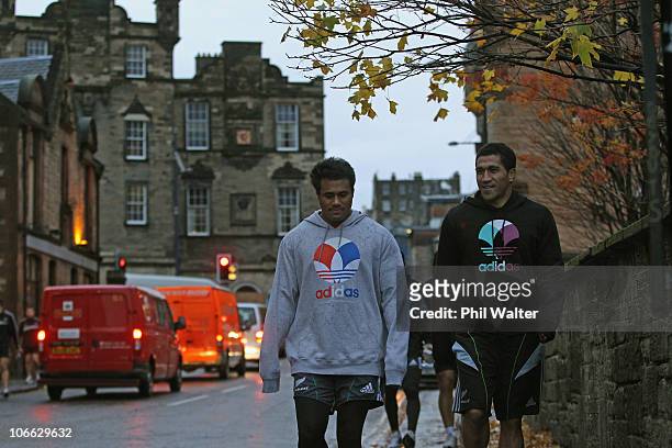 Isaia Toeava and Mils Muliaina of the All Blacks walk home from a New Zealand All Blacks Recovery Session at The Pleasance on November 8, 2010 in...