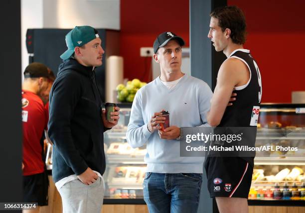 Matthew Lloyd chats with Josh Battle and Max King of the Saints during a St Kilda Saints AFL training session at RSEA Park on November 29, 2018 in...