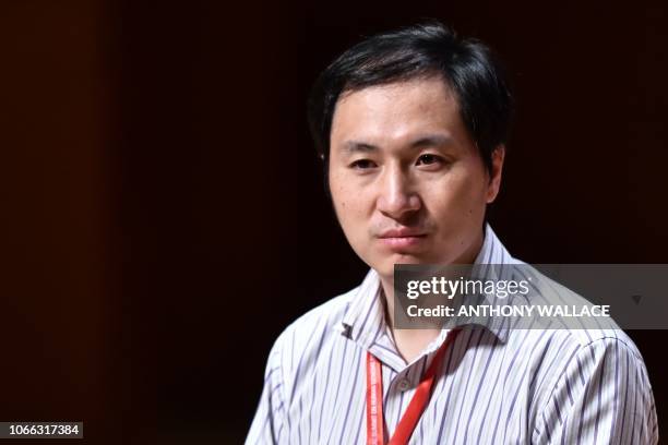 In this picture taken on November 28 Chinese scientist He Jiankui reacts during a panel discussion after his speech at the Second International...