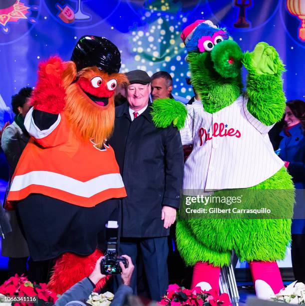Philadelphia Flyers mascot Gritty, The 99th Mayor of Philadelphia Jim Kenney and The Phillie Phanatic on stage during the 2018 City Of Philadelphia...