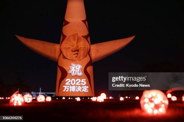 The Tower of the Sun, the symbol of the 1970 World Exposition that was designed by the late artist Taro Okamoto, is lit up in Suita, Osaka...