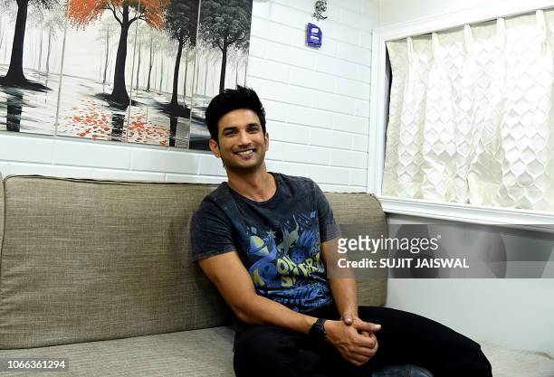 Indian Bollywood actors Sushant Singh Rajput poses inside the make-up vanity van before a promotional event for the upcoming romantic drama Hindi...