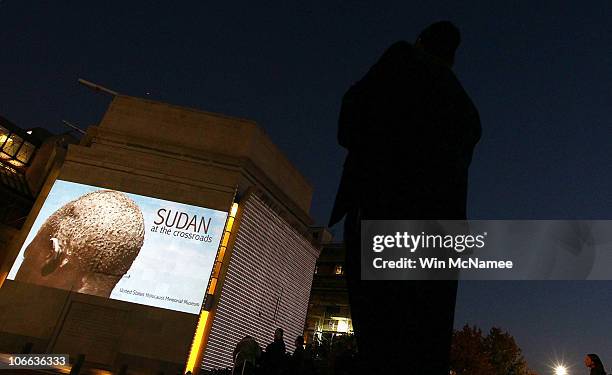 Images from South Sudan are projected onto the exterior of the United States Holocaust Memorial Museum November 8, 2010 in Washington, DC. The images...