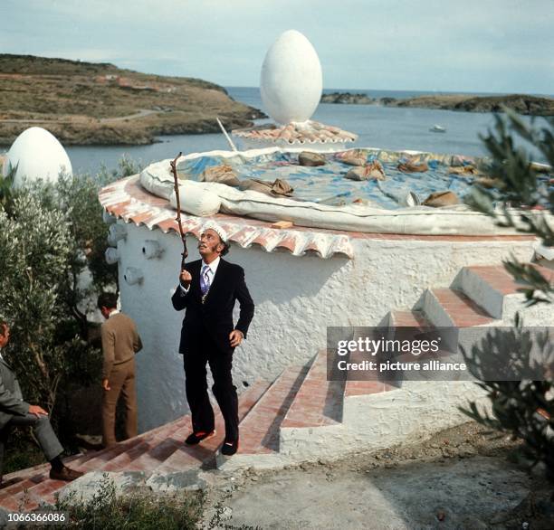 Spanish artist Salvador Dali on the grounds of his residence at the Costa Brava in September 1968. | usage worldwide