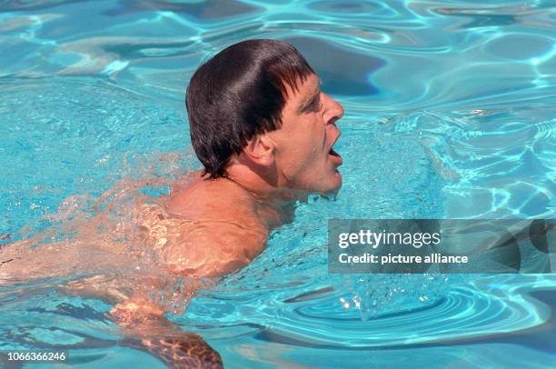 Premier of Lower Saxony, Gerhard Schroeder, swimming in an outdoor swimming pool for the Deutsches Sportabzeichen für Maenner und Frauen in Peine,...