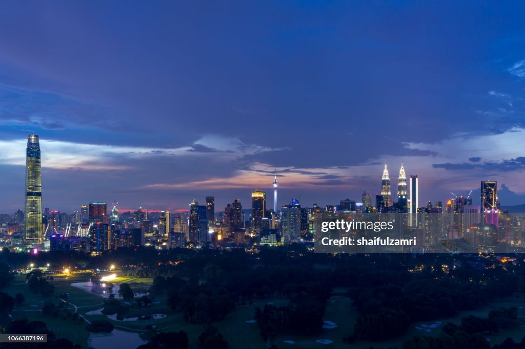 Majestic sunset over Kuala Lumpur, capital of Malaysia. Its modern skyline is dominated by the 451m tall KLCC, a pair of glass and steel clad skyscrapers.