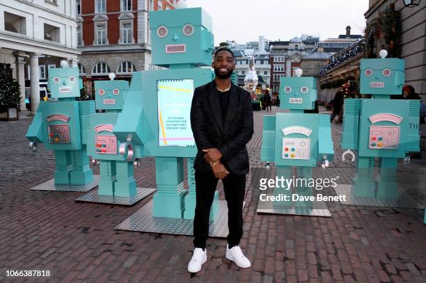 Tinie Tempah unveils an installation of Tiffany Blue Robots and a boom box playing a mix of seasonal tracks in the heart of Covent Garden at Tiffany...