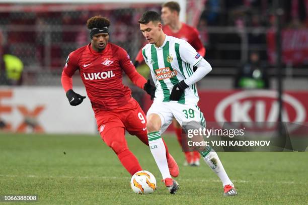 Spartak Moscow's Cape Verdean forward Ze Luis and Rapid Wien's Austrian midfielder Dejan Ljubicic vie for the ball during the UEFA Europa League...