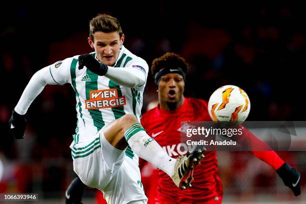 Maximilian Hofmann of Rapid Wien in action against Ze Luis of Spartak Moscow during UEFA Europa League Group G soccer match between Spartak Moscow...