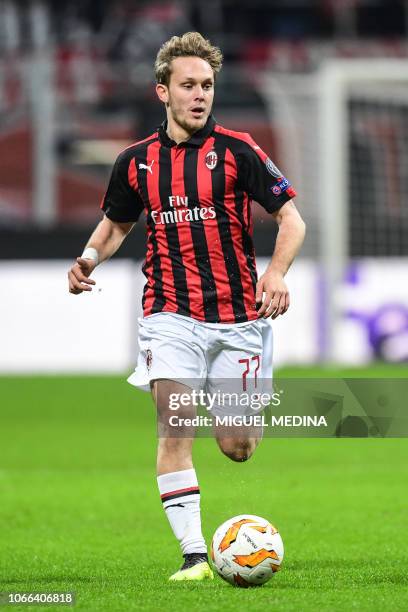 Milan's Croatian forward Alen Halilovic runs with the ball during the UEFA Europa League group F football match AC Milan vs F91 Dudelange on November...