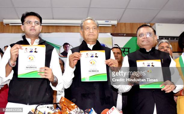 Former CM Ashok Gehlot along with State Congress president Sachin Pilot AICC General Secretary and incharge Rajasthan Avinash Pande release Congress...