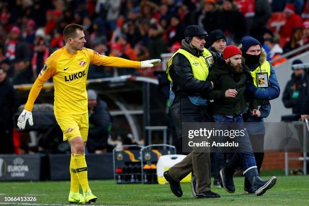 Pitch invader is seen during UEFA Europa League Group G soccer match between Spartak Moscow and Rapid Wien at the Stadion Spartak in Moscow, Russia...