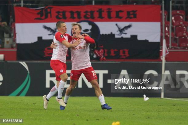 Fredrik Gulbrandsen of Salzburg celebrates with Stefan Lainer of Salzburg the opening goal during the UEFA Europa League match between FC Salzburg...