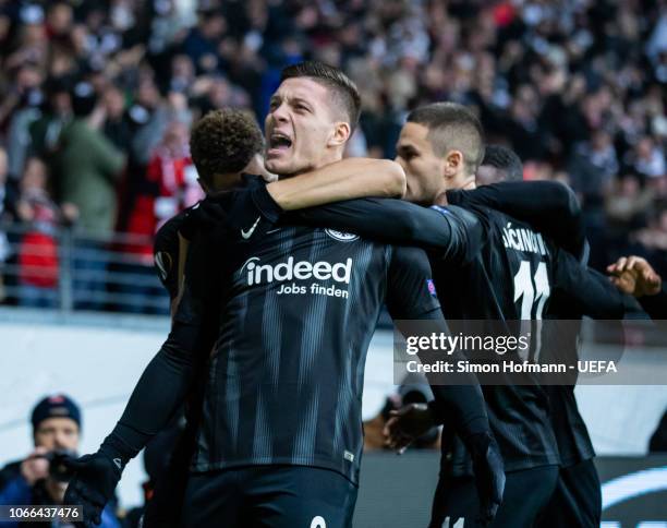 Luka Jovic of Frankfurt celebrates his team's first goal with his team mates Mijat Gacinovic and Simon Falette during the UEFA Europa League Group H...