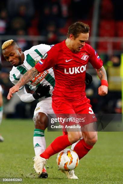 Boli Bolingoli of Rapid Wien in action against Andrei Eschenko of Spartak Moscow during UEFA Europa League Group G soccer match between Spartak...