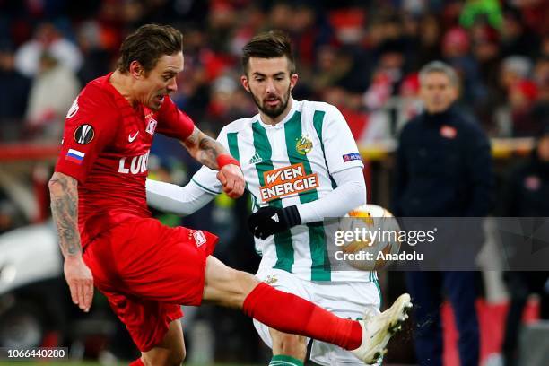 Marvin Potzmann of Rapid Wien in action against Andrei Eschenko of Spartak Moscow during UEFA Europa League Group G soccer match between Spartak...