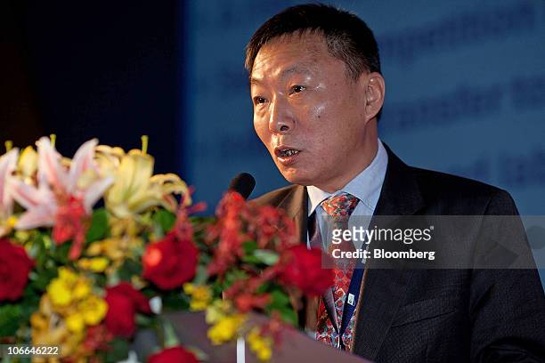 Zhou Xiaoxi, vice chairman and president of the Guangzhou Port Group Co. Ltd., speaks at the World Shipping Summit in Guangzhou, Guangdong Province,...