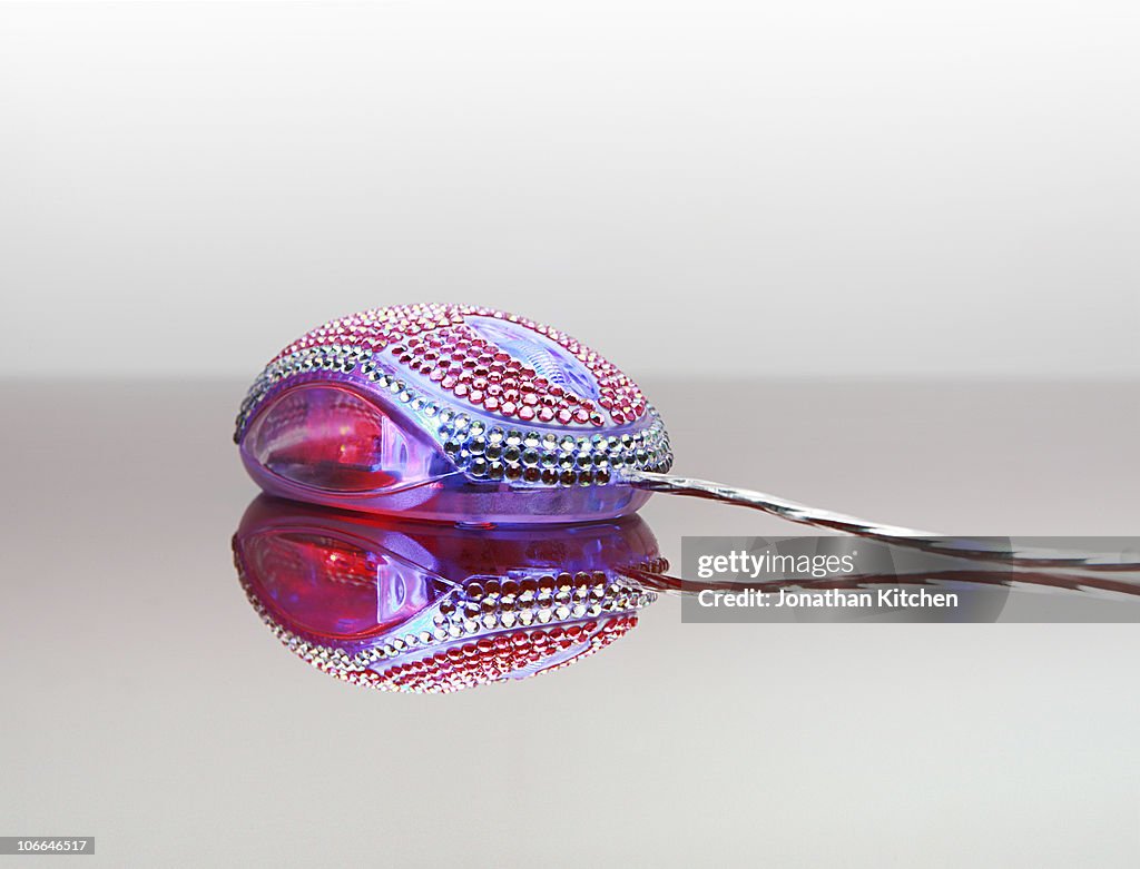 Computer mouse covered in jewels