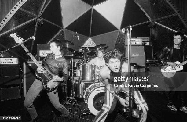 British punk rock band The Drones perform at Top Rank Sheffield, 12th June 1977. Left to right: Steve 'Whisper' Cundall, Peter 'Perfect' Howells,...