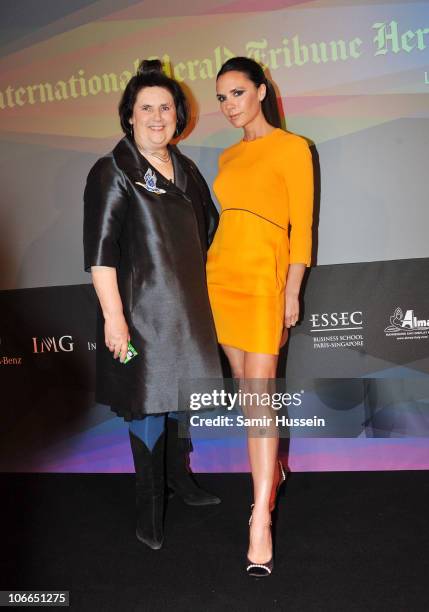 Fashion editor of the International Herald Tribune Suzy Menkes and guest speaker Victoria Beckham attend Day 1 of the International Herald Tribune...