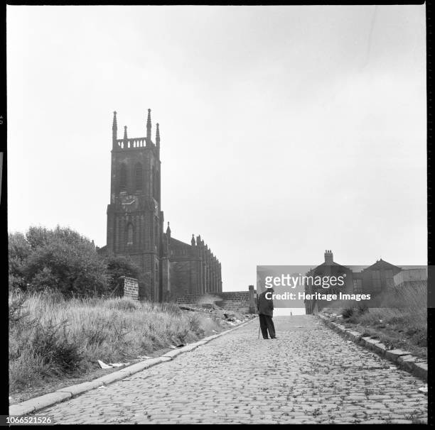 St Mary's Church, St Mary's Street, Quarry Hill, Leeds, West Yorkshire, circa 1966 A view looking towards the church with an elderly man standing in...