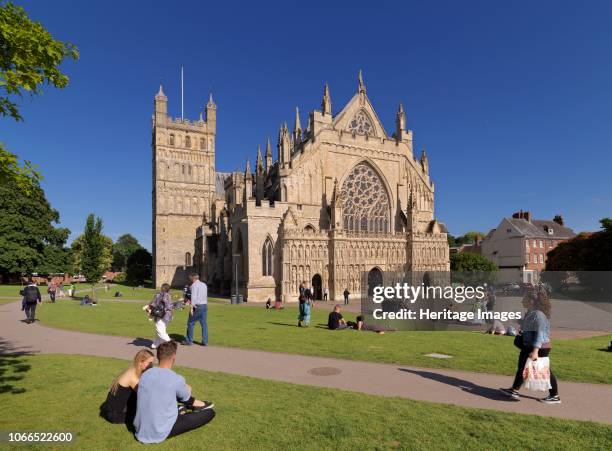 Exeter Cathedral, Devon, circa 2010 General view of the cathedral from the north-west, with people relaxing on the lawns in the foreground. Artist...