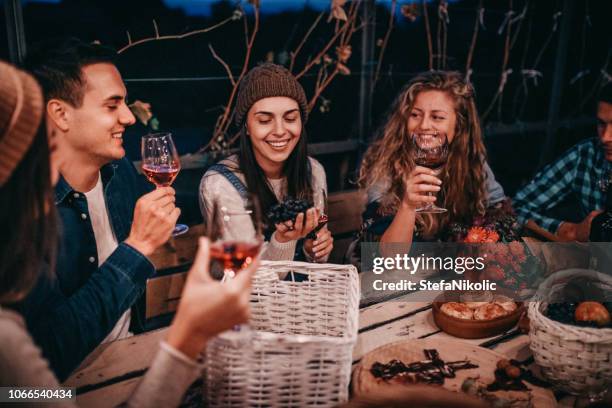 young people enjoying wine - firecracker vine stock pictures, royalty-free photos & images